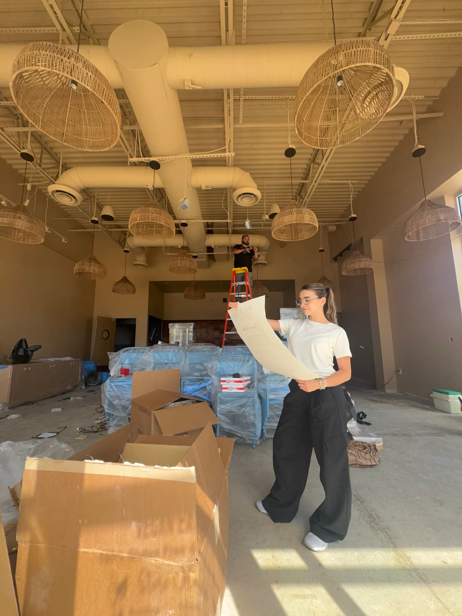 Reading plans on site during a restaurant build-out